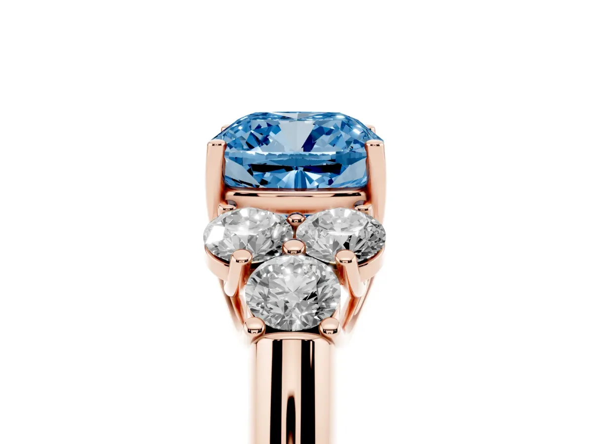 Fancy Blue Cushion Cut Cut Diamond Cluster Ring with Round Accent Stones and Prong Setting on a Classic Band Rose gold