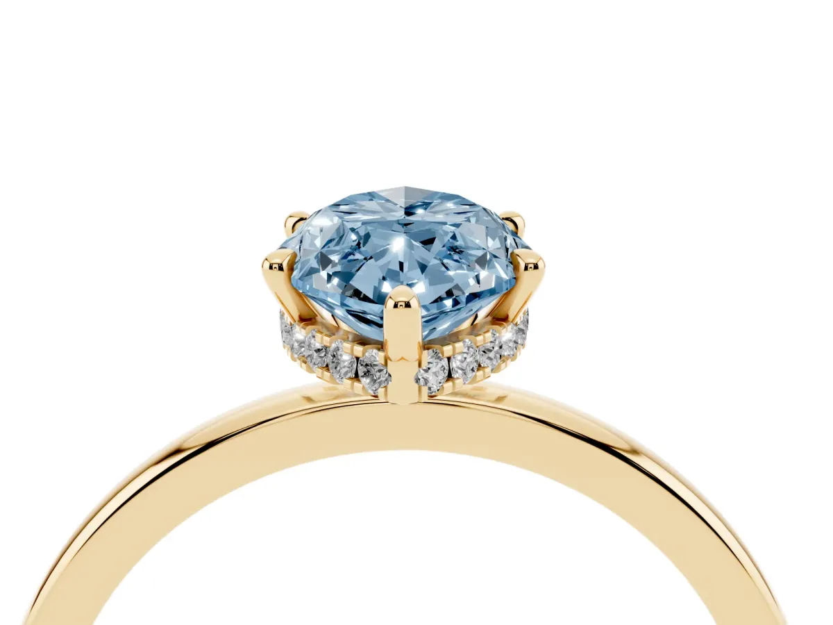 Fancy Blue Marquise Cut Solitaire Engagement Ring with Cathedral Band and Four-Prong Setting Yellow gold