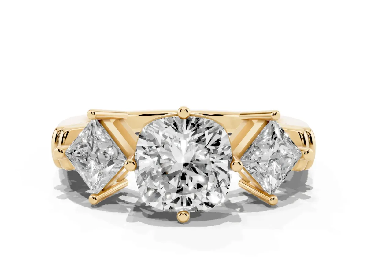 Three-Stone Cushion Cut and Princess Cut Diamond Ring with Channel Band and Four-Prong Setting Yellow gold