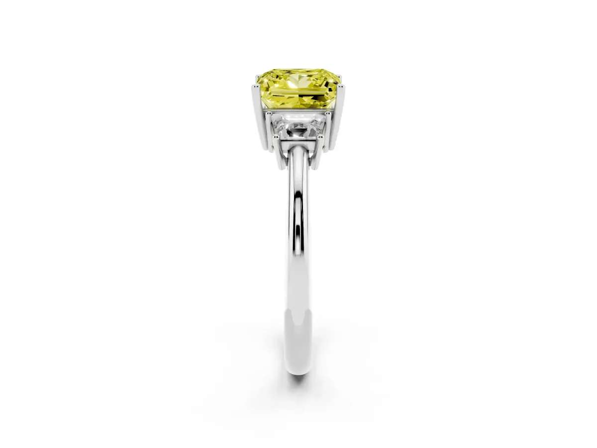 Fancy Yellow Princess Cut Diamond Three-Stone Ring with Trapezoid Side Stones and Prong Setting Silver