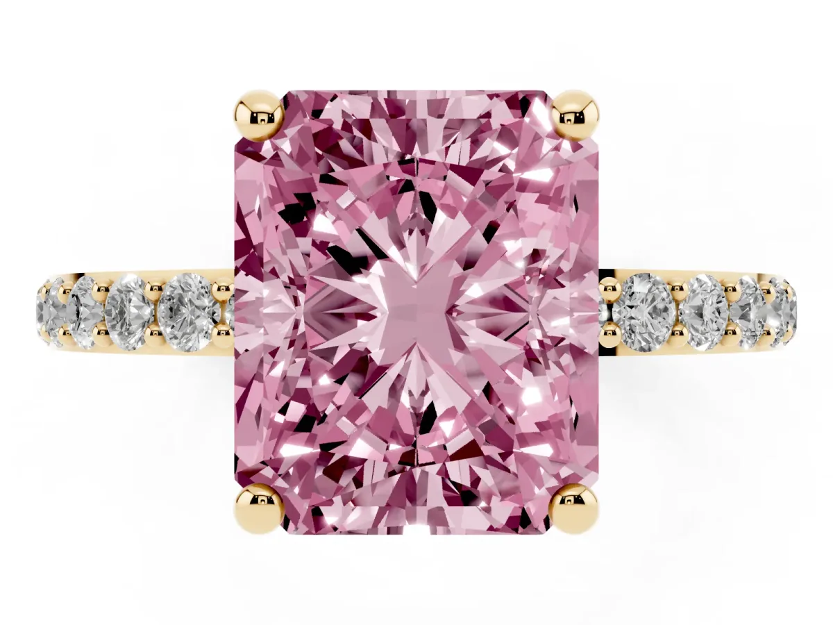 Fancy Pink Radiant Cut Diamond Solitaire Ring with Round Pavé Band and Prong Setting Yellow gold