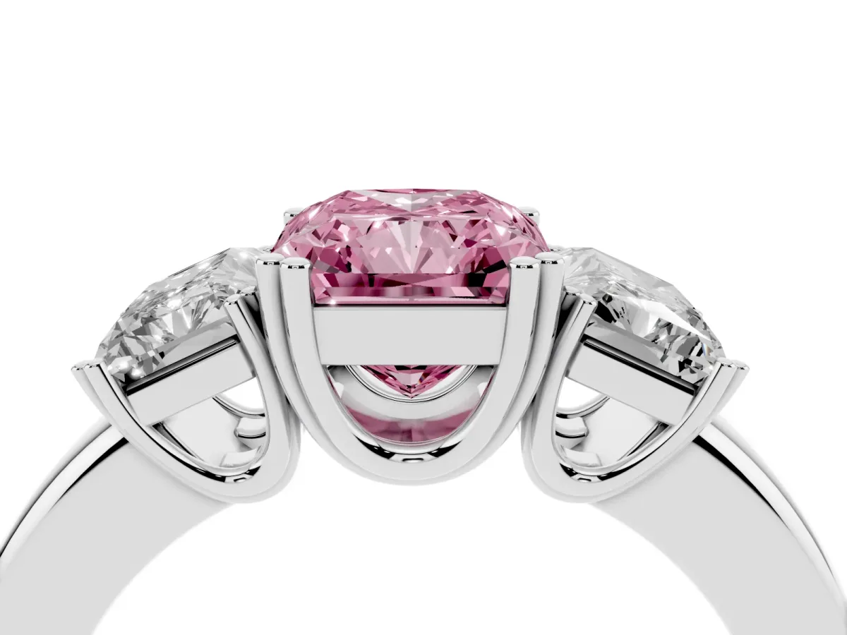 Fancy Pink Three-Stone Radiant Cut Cut Diamond Ring with Channel Set Band and Four-Prong Setting Platinum