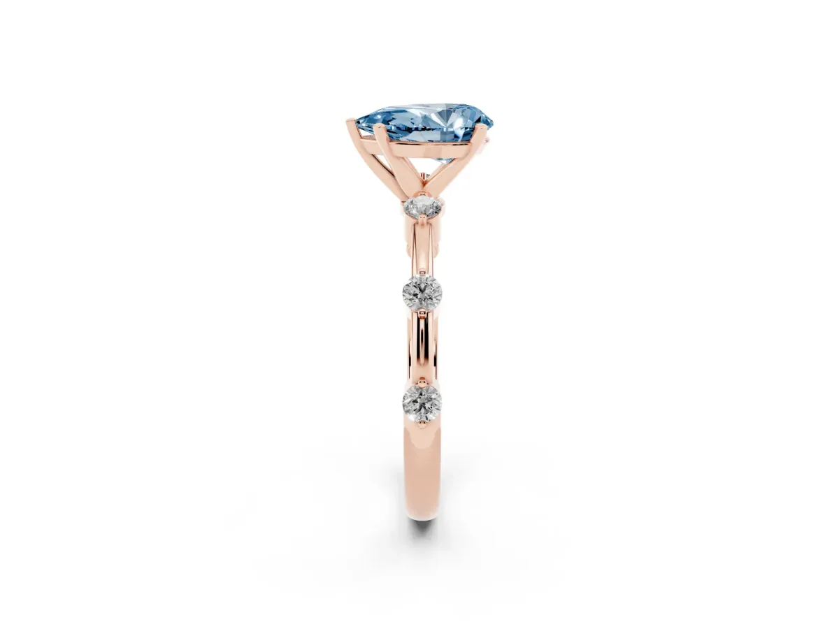 Fancy Blue Pear Cut Solitaire Diamond Ring with Bezel Set Side Stones and Prong Setting Rose gold