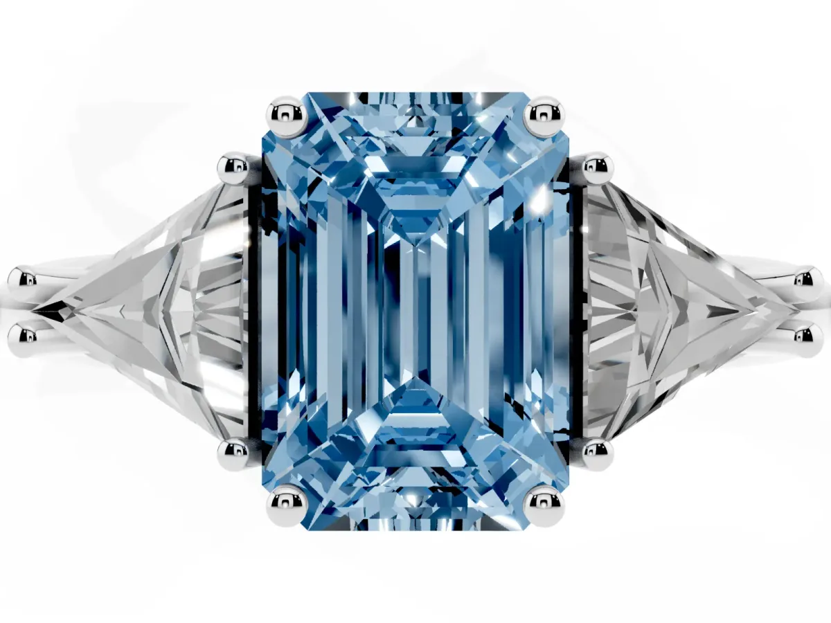 Fancy Blue Three-Stone Emerald Cut Diamond Engagement Ring with Trillion Side Stones and Prong Setting Silver