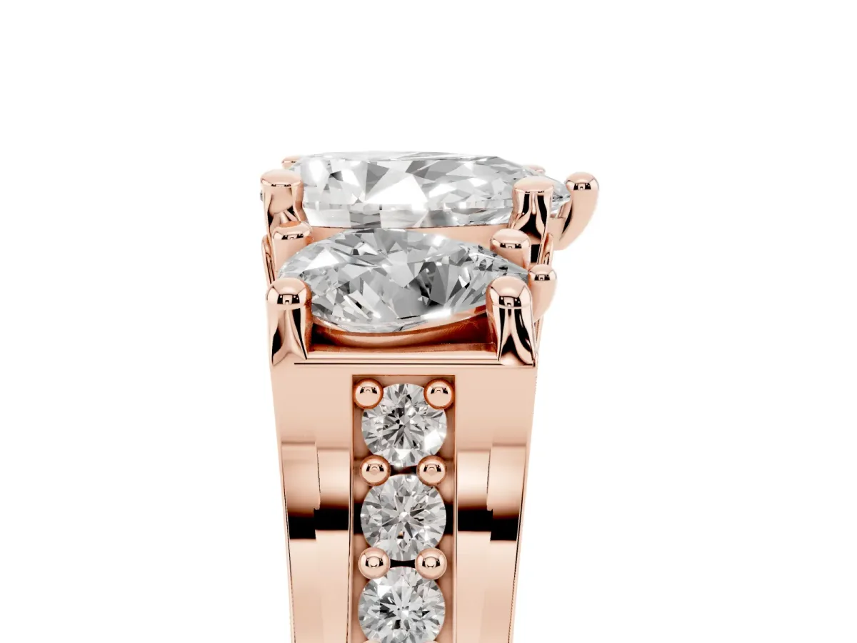 Pear Cut Diamond Three-Stone Ring with Channel Set Band and Four-Prong Setting Rose gold