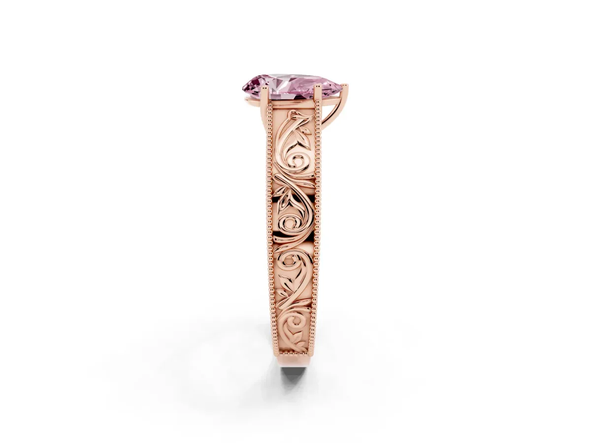 Fancy Pink Pear Cut Diamond Solitaire Ring with Engraved Band and Four-Prong Setting Rose gold