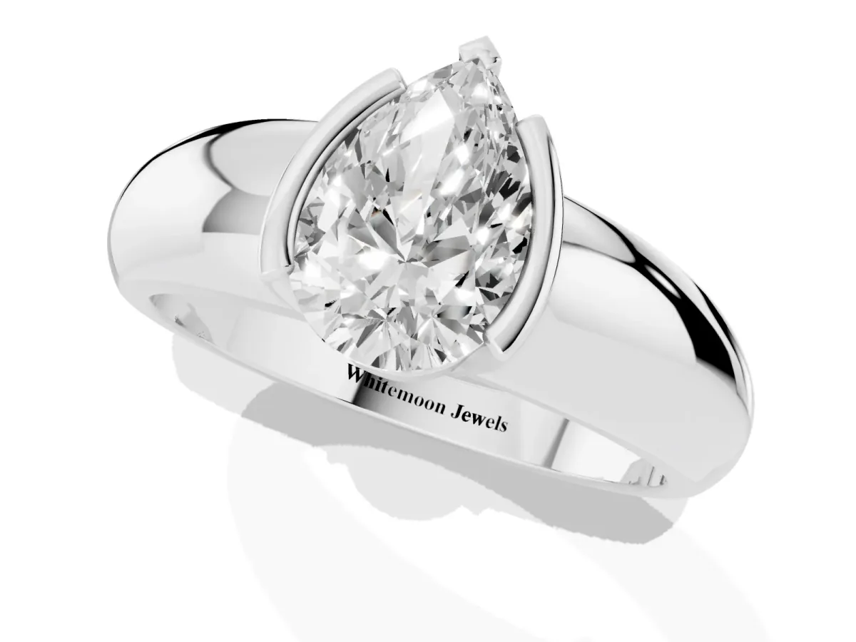 Pear Cut Solitaire Tension Set Diamond Ring with Wide Band Platinum