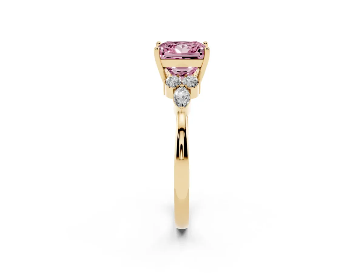 Fancy Pink Princess Cut Brilliant Diamond Solitaire Ring with Pear Side Stones and Four-Prong Setting Yellow gold