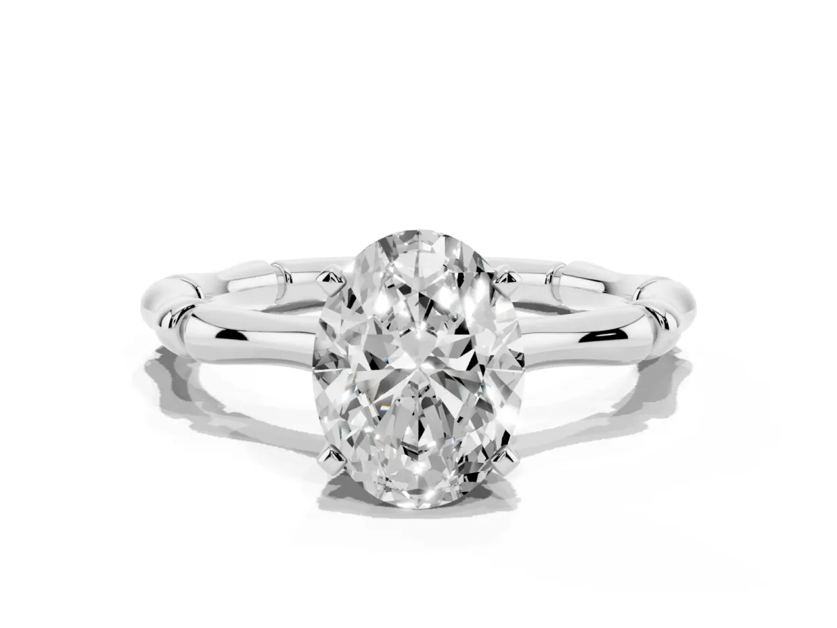 Oval Cut Solitaire Diamond Ring with Bamboo Band and Four-Prong Setting Silver