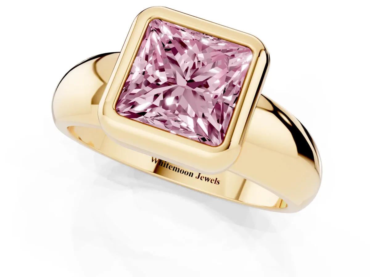 Fancy Pink Bezel Set Princess Cut Solitaire Ring with Wide Band Yellow gold