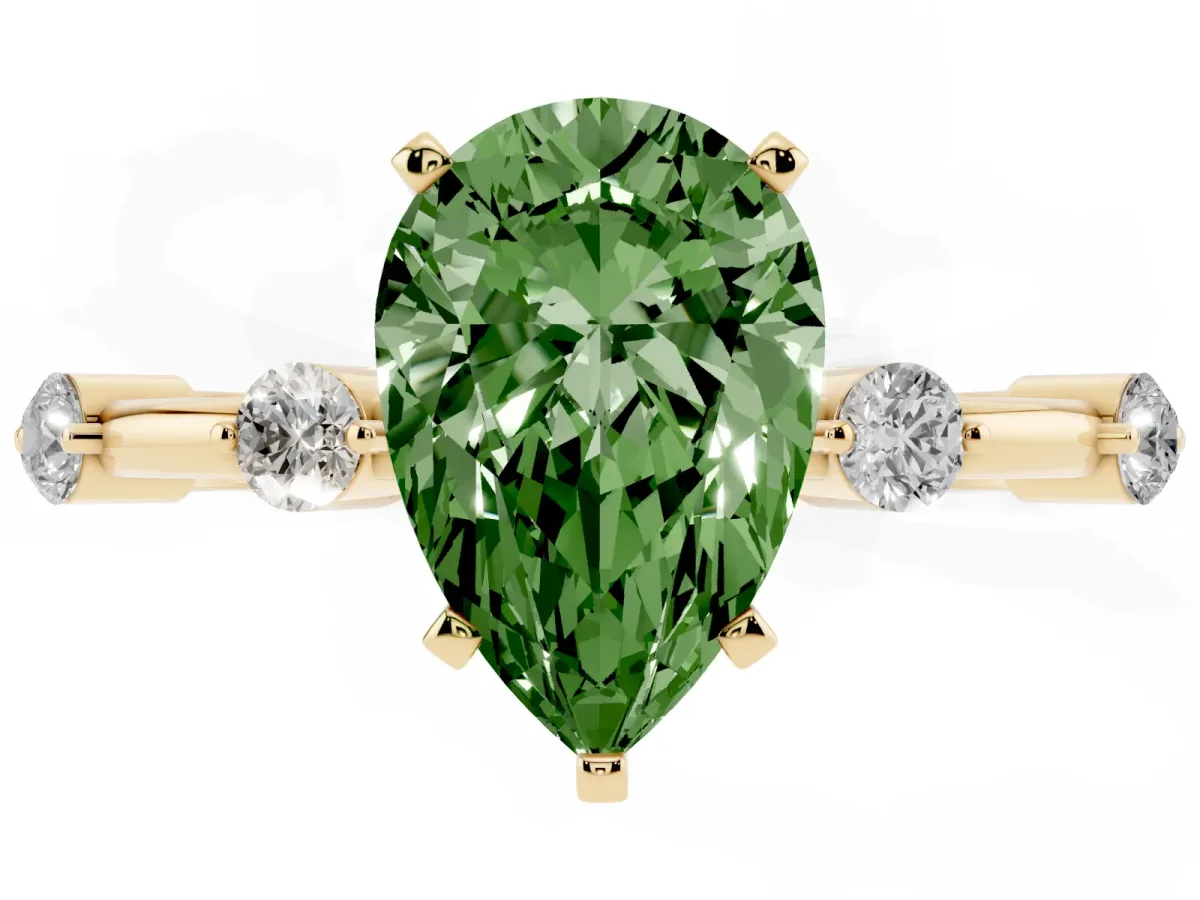 Fancy Green Pear Cut Solitaire Diamond Ring with Bezel Set Side Stones and Prong Setting Yellow gold
