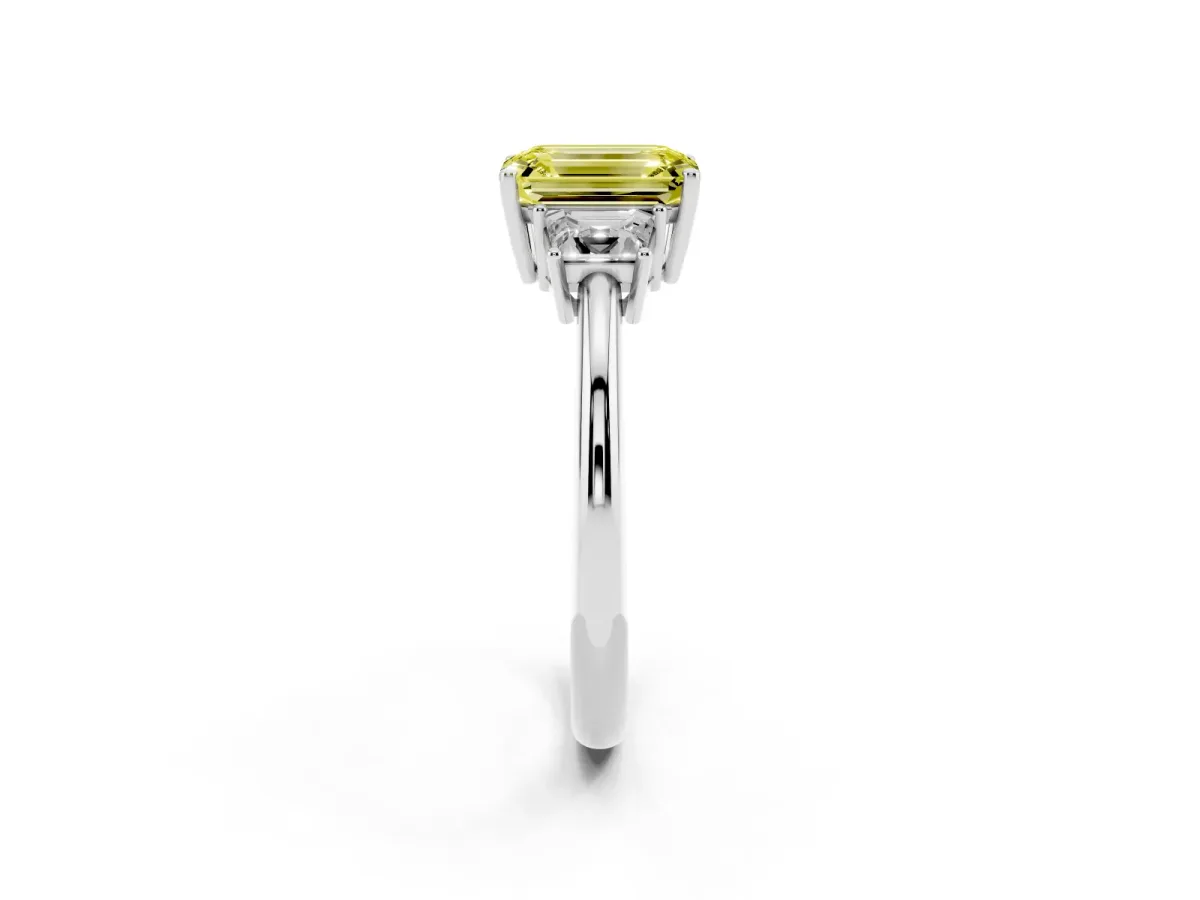 Fancy Yellow Emerald Cut Diamond Three-Stone Ring with Trapezoid Side Stones and Prong Setting Silver