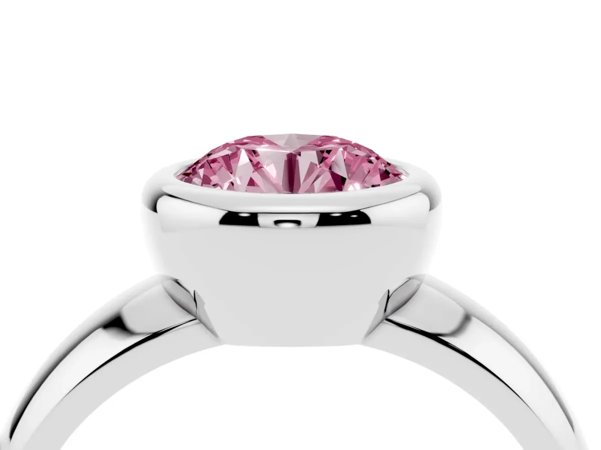 Fancy Pink Bezel Set Round Cut Solitaire Ring with Wide Band White gold