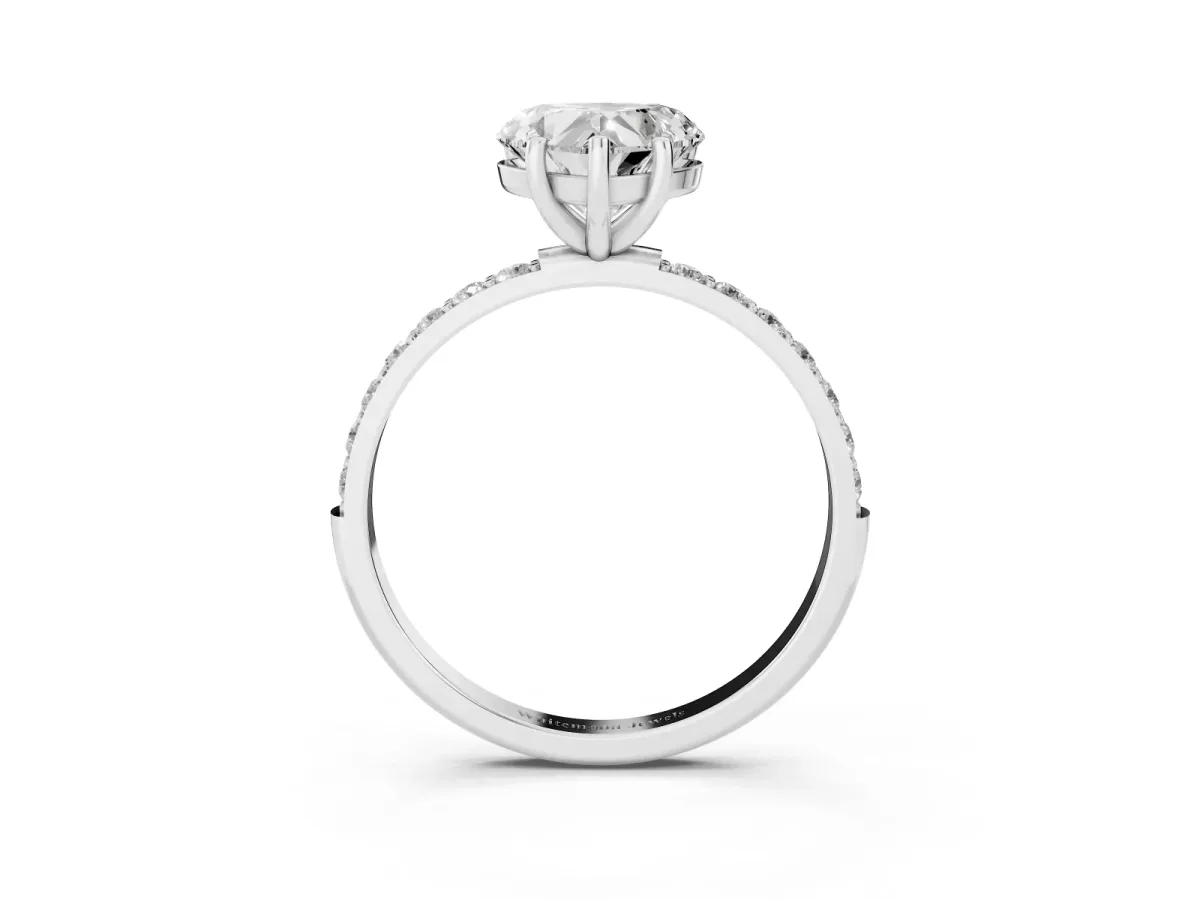 Heart Cut Diamond Solitaire Ring with Round Pavé Shoulders and Prong Setting Silver