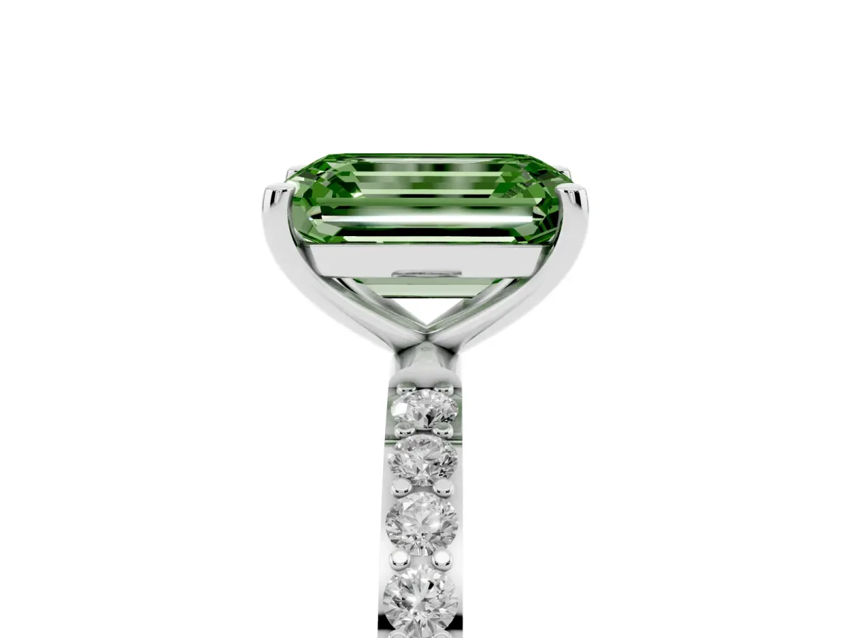 Fancy Green Emerald Cut Diamond Solitaire Ring with Round Pavé Shoulders and Prong Setting Silver
