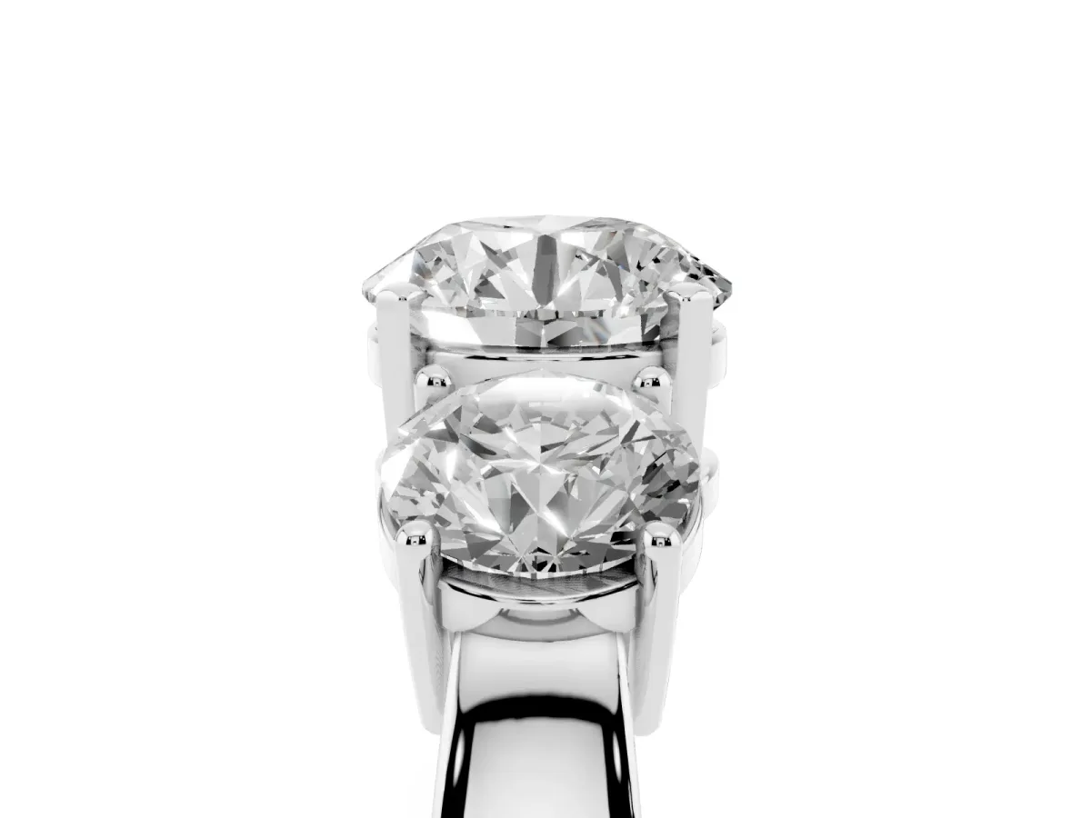 Three-Stone Round Cut Diamond Ring with Round Side Stones, Classic Band, and Four-Prong Setting White gold