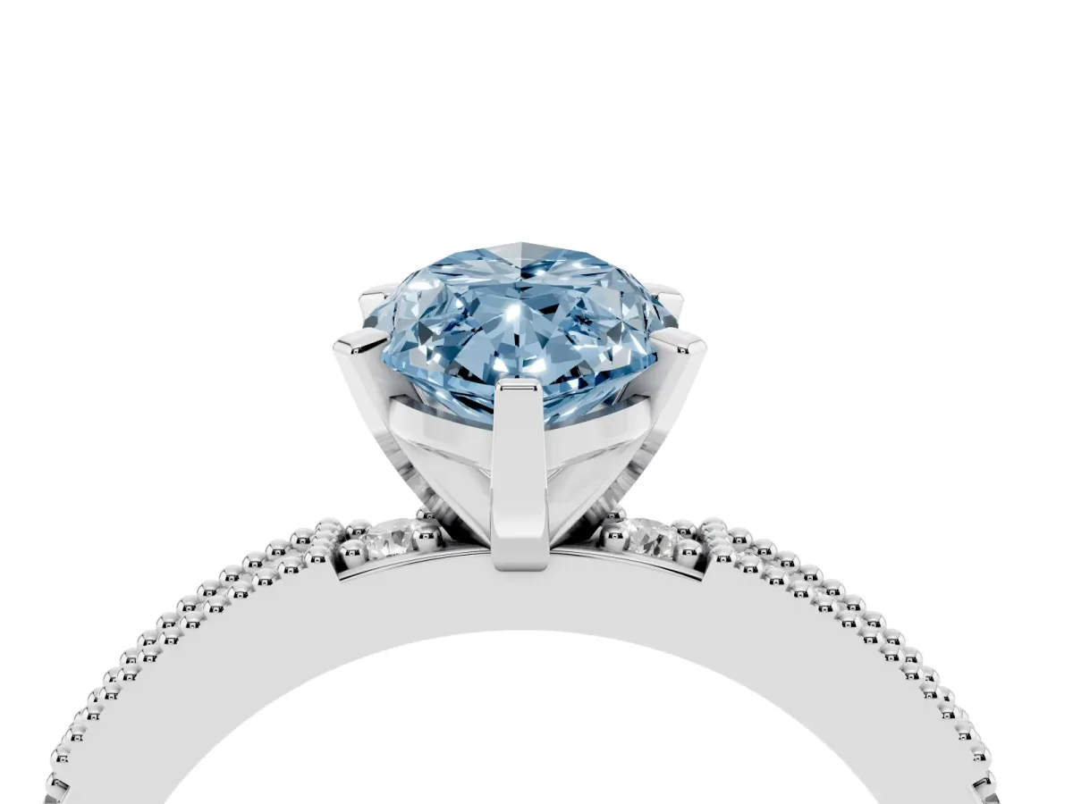 Fancy Blue Marquise Cut Solitaire with Pavé Band and Four-Prong Setting Silver