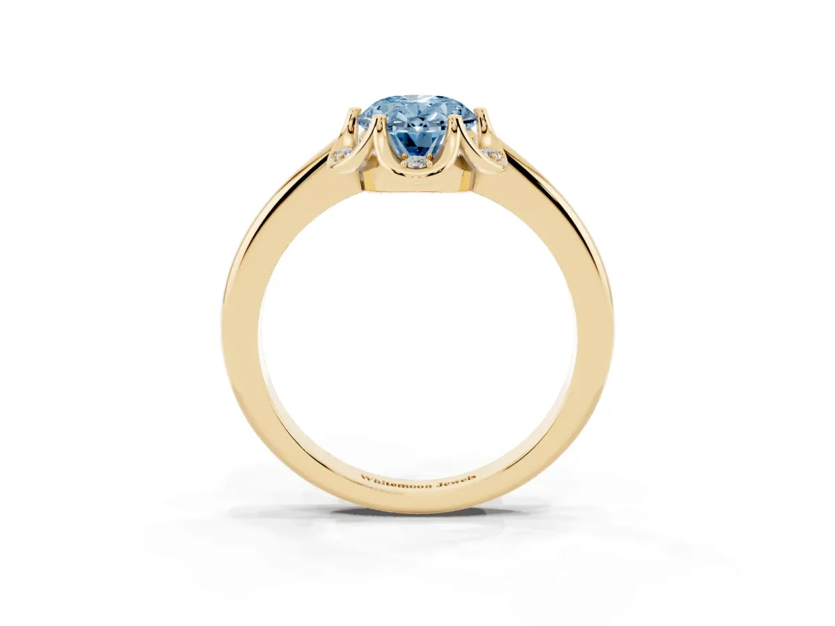 Fancy Blue Oval Cut Halo Diamond Ring with Round Cluster Setting, Solitaire Band, and Four-Prong Setting Yellow gold