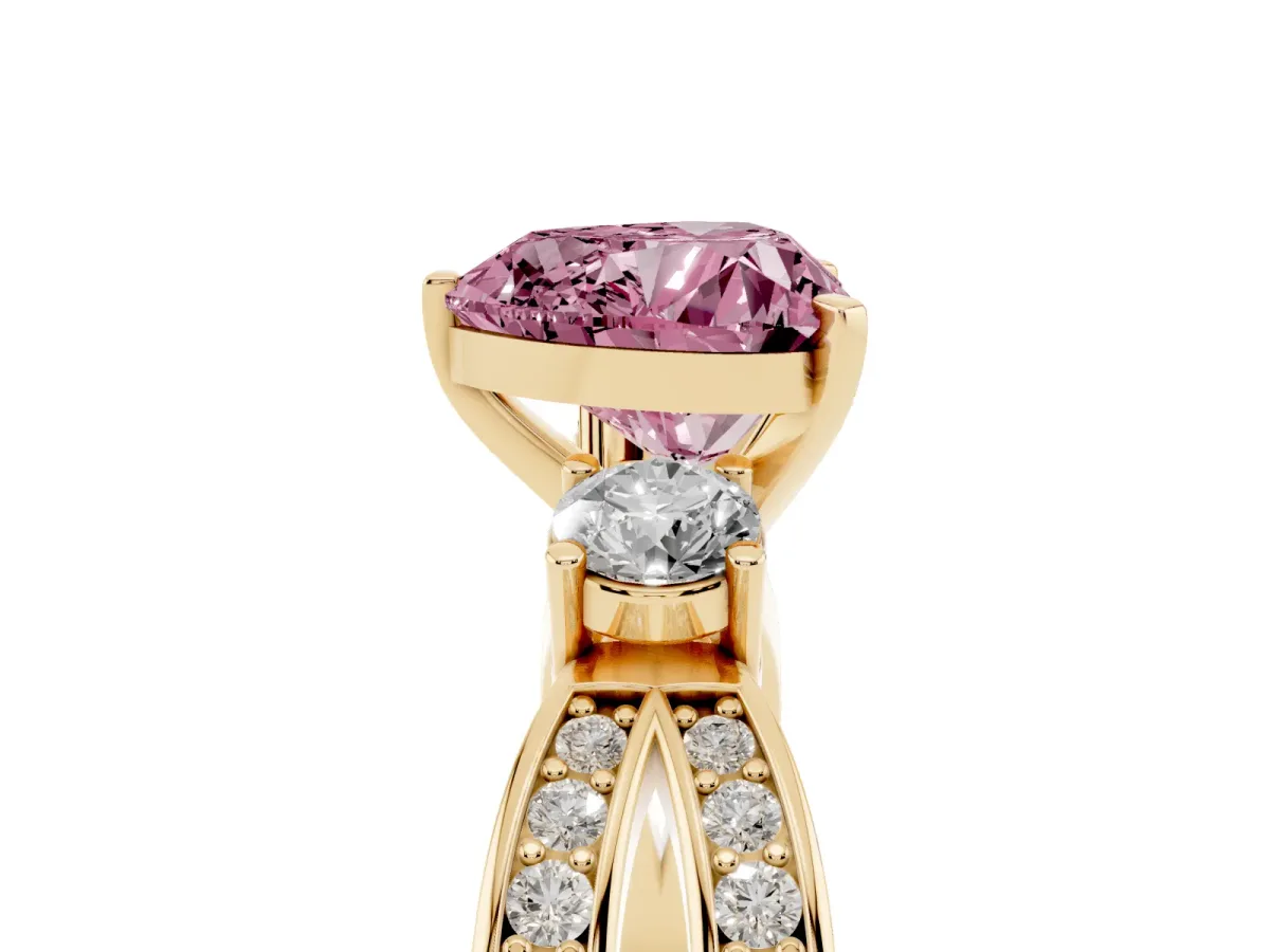 Fancy Pink Three-Stone Heart Cut Cut Diamond Twist Band with Prong Setting Yellow gold