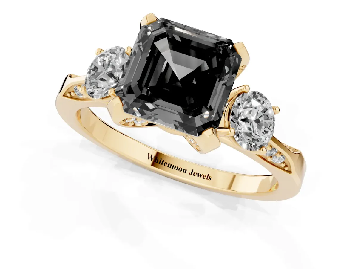 Fancy Black Asscher Cut Brilliant Three-Stone Diamond Ring with Pavé Band and Four-Prong Setting Yellow gold
