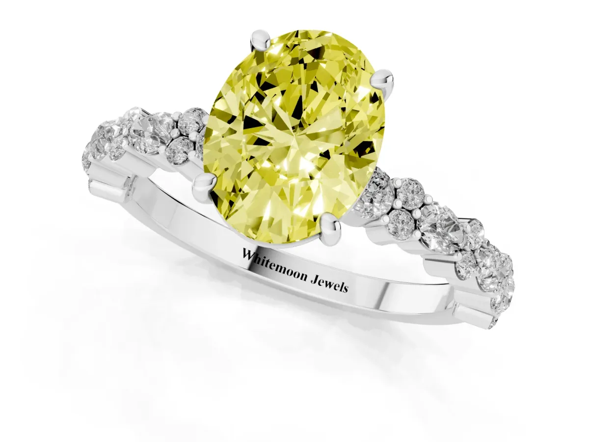 Fancy Yellow Oval Cut Diamond Side Stone Solitaire Ring with Round and Four-Prong Setting Platinum