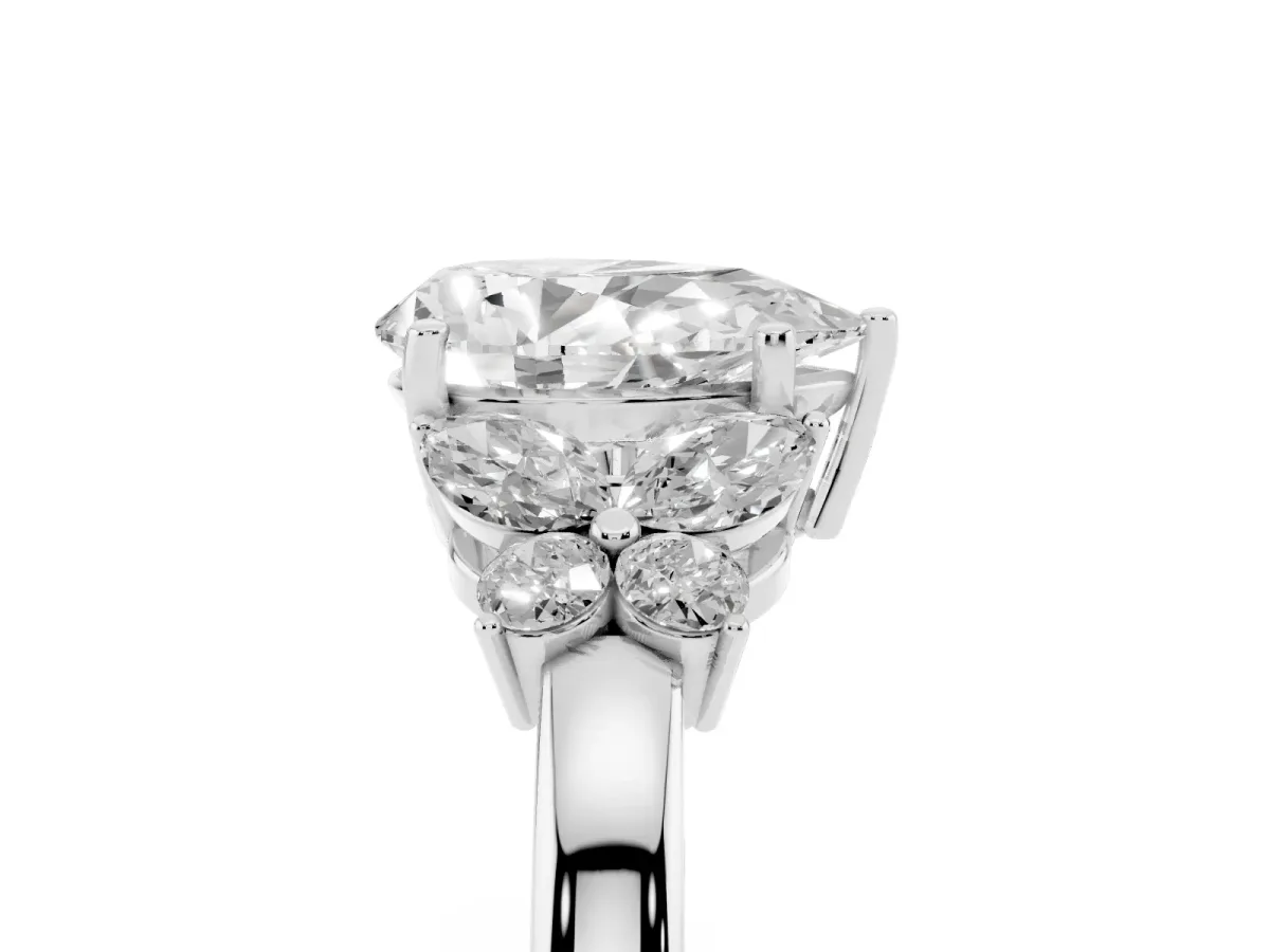 Pear Cut Cut Solitaire Floral Diamond Ring with Four-Prong Setting Platinum