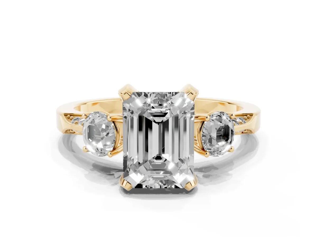 Fancy Black Emerald Cut Brilliant Three-Stone Diamond Ring with Pavé Band and Four-Prong Setting Yellow gold