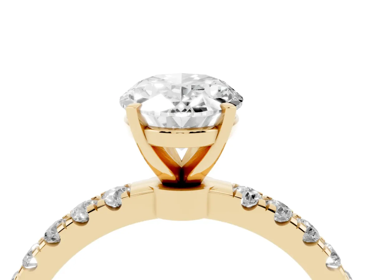 Oval Cut Diamond Solitaire Ring with Pavé Accents and Four-Prong Setting Yellow gold