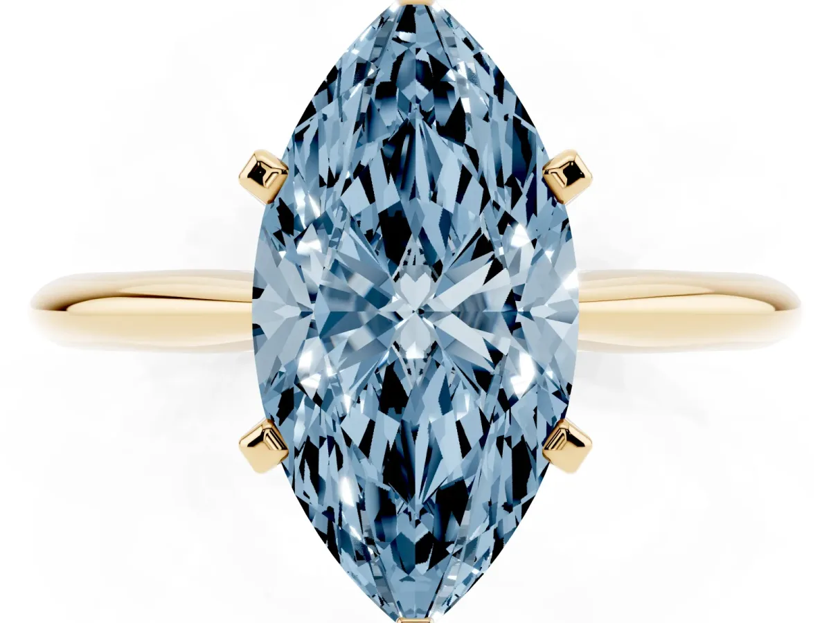 Fancy Blue Marquise Cut Cut Solitaire Ring with Four-Prong Setting on a Classic Band Yellow gold