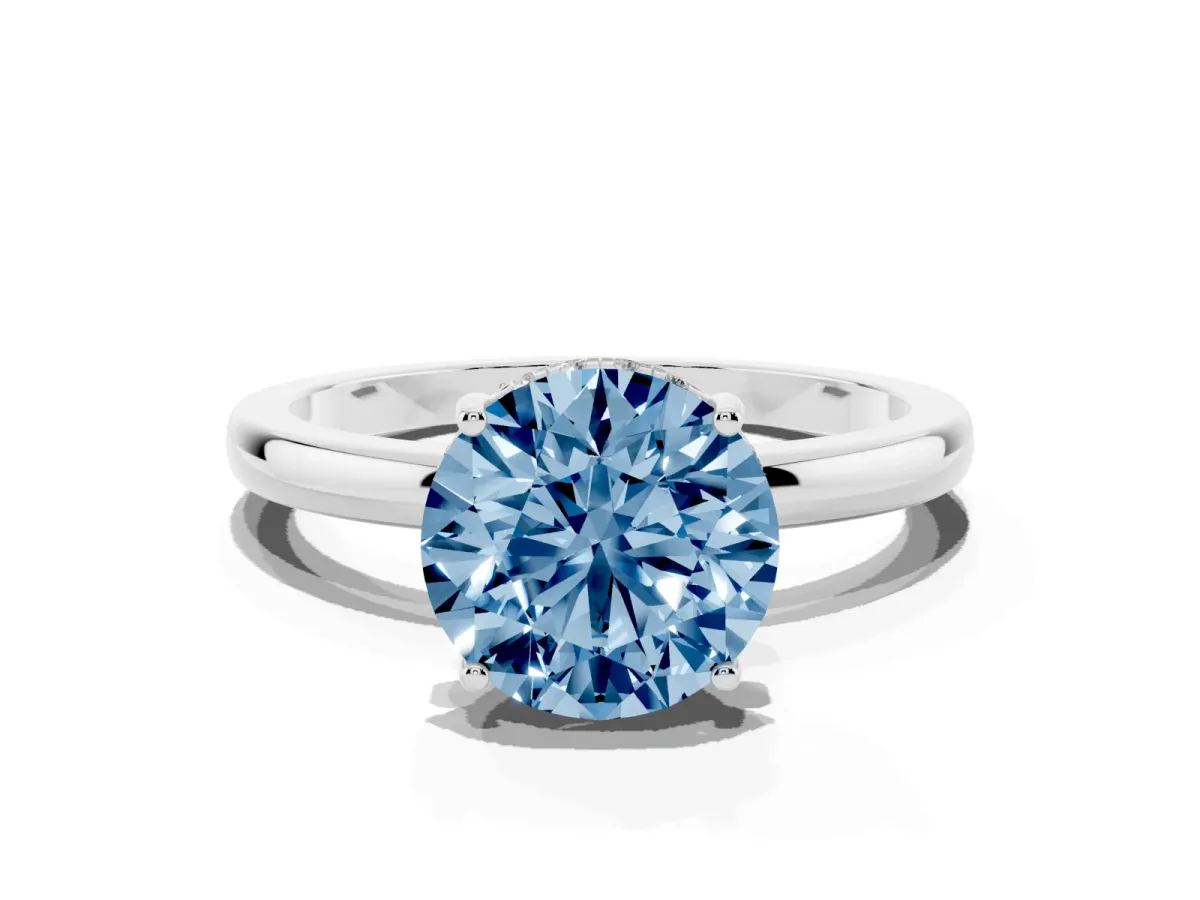 Fancy Blue Round Cut Solitaire Diamond Ring with Prong Setting and Plain Band Platinum
