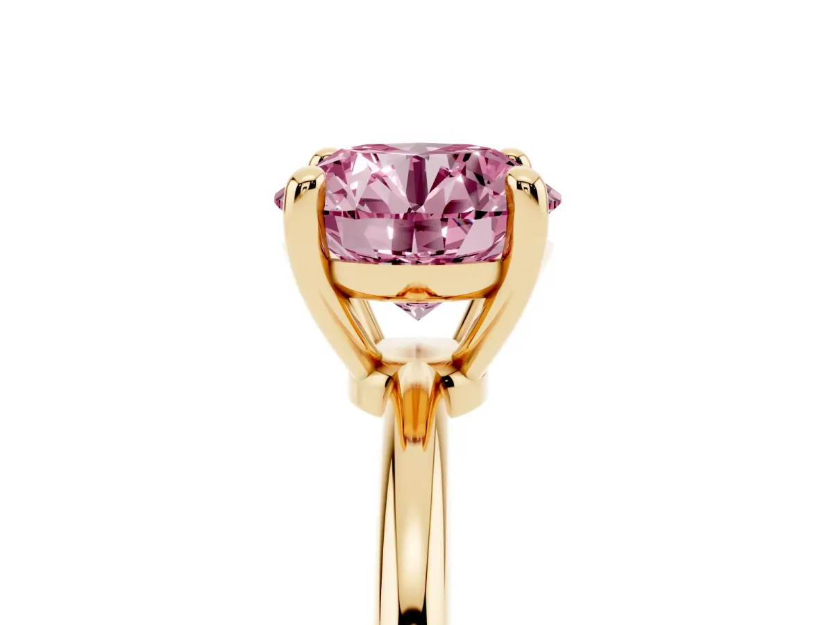 Fancy Pink Round Cut Solitaire Diamond Ring with 4-Prong Setting on a Classic Band Yellow gold