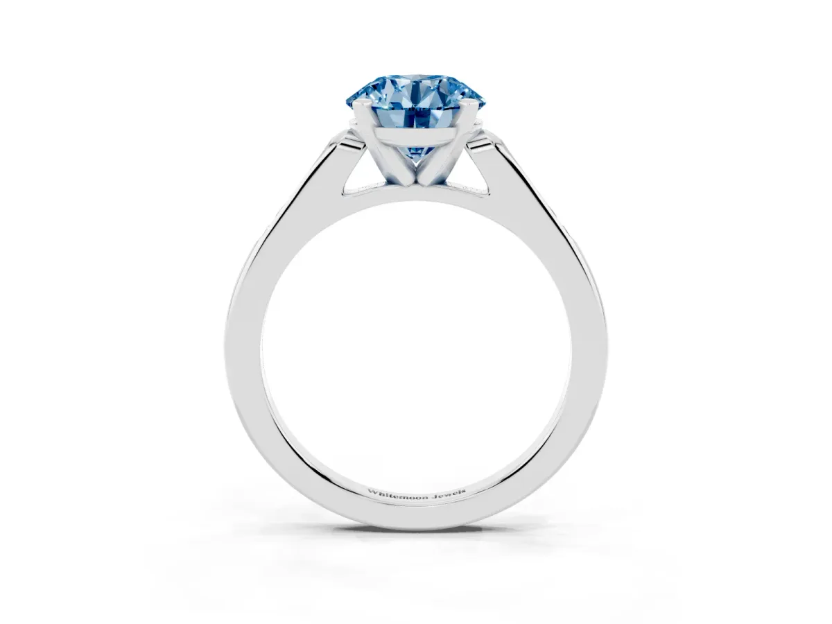Fancy Blue Round Cut Diamond Solitaire Ring with Channel Set Round Band and Prong Setting Silver