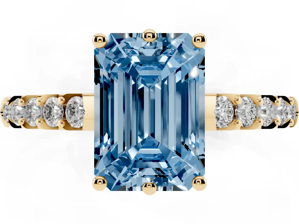 Fancy Blue Emerald Cut Solitaire Diamond Engagement Ring with Pavé Band and Six-Prong Setting Yellow gold