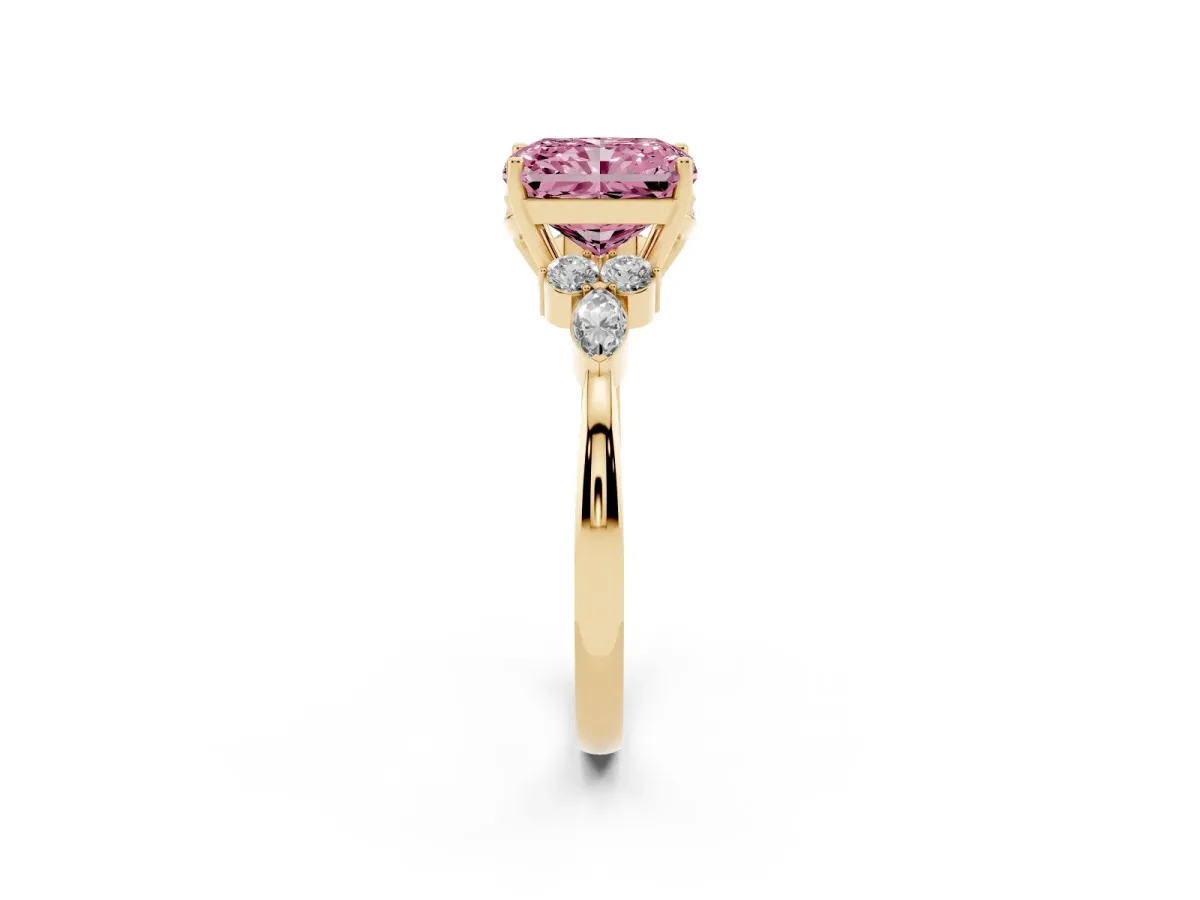 Fancy Pink Radiant Cut Brilliant Diamond Solitaire Ring with Pear Side Stones and Four-Prong Setting Yellow gold