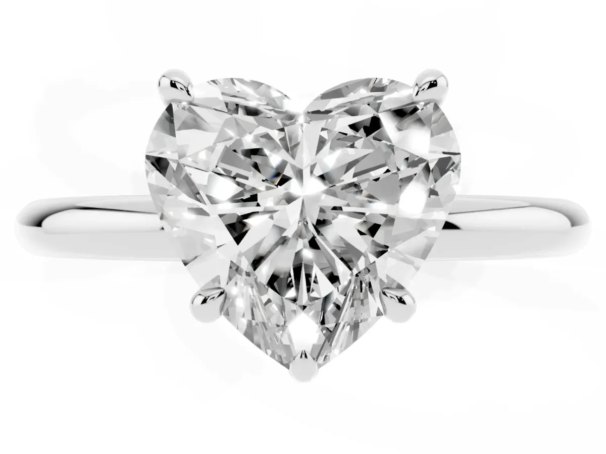 Heart Cut Diamond Solitaire Ring with Thin Band and Four-Prong Setting Platinum