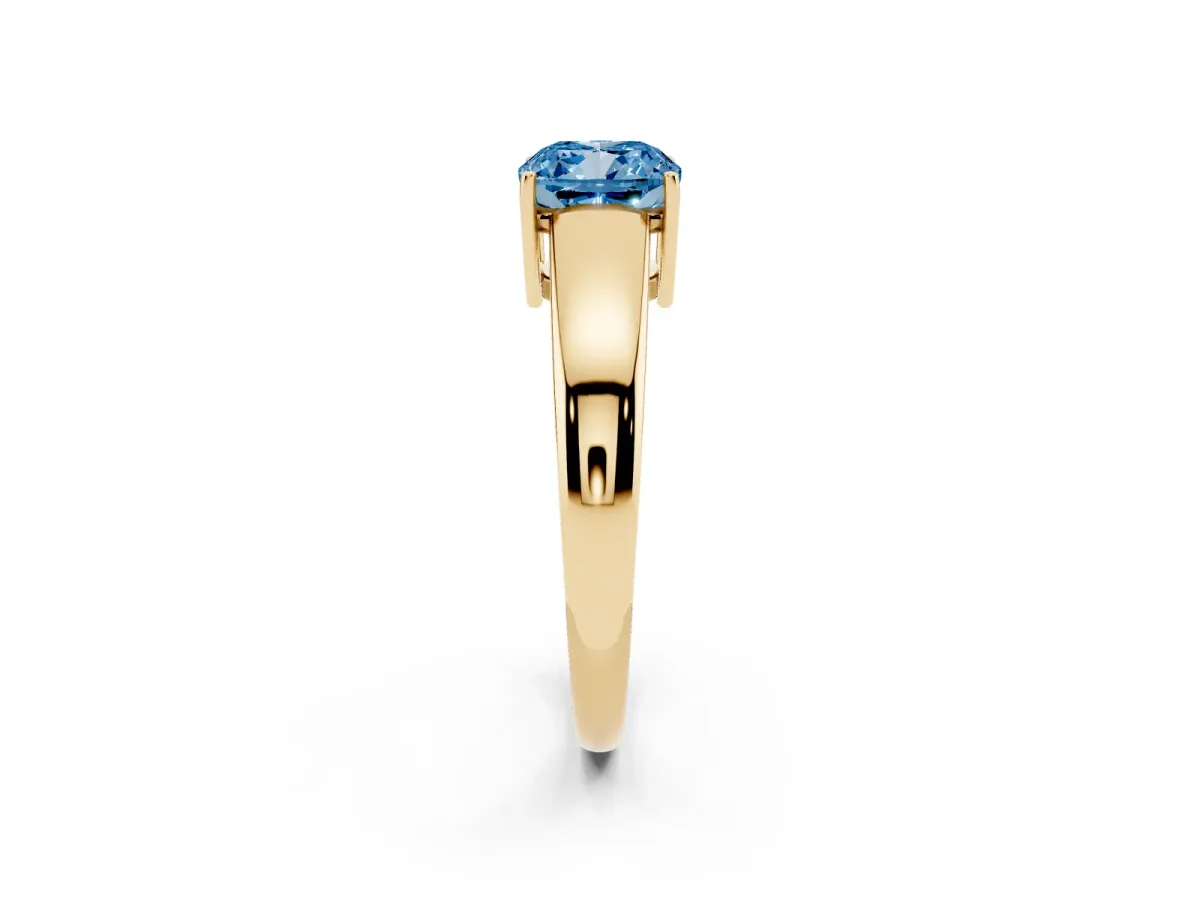 Fancy Blue Cushion Cut Solitaire Diamond Ring with Tapered Band and Four-Prong Setting Yellow gold