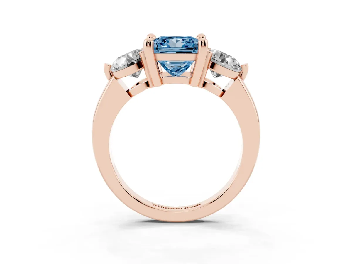 Fancy Blue Three-Stone Princess Cut Brilliant Cut Solitaire Ring with Prong Setting on a Classic Band Rose gold