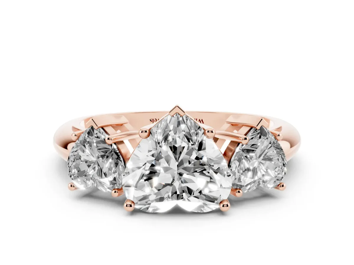 Three-Stone Heart Cut Cut Diamond Engagement Ring with Prong Setting on a White Gold Band Rose gold
