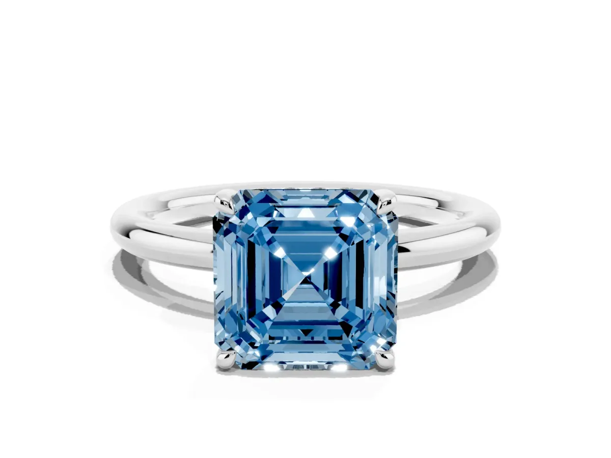 Fancy Blue Asscher Cut Diamond Solitaire Ring with Thin Band and Four-Prong Setting Silver
