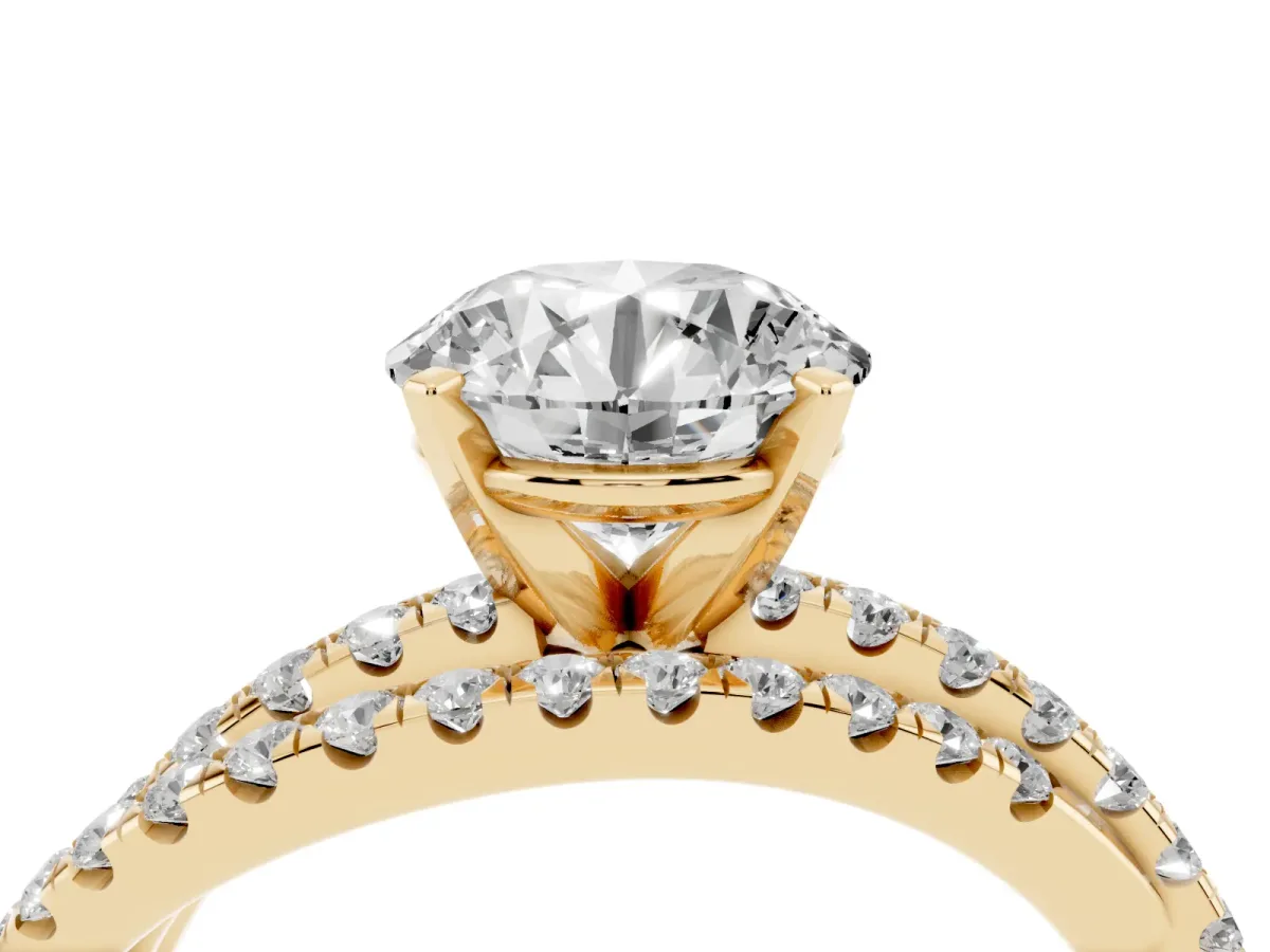 Round Cut Solitaire Twist Band with Pavé Setting and Four-Prong Setting Yellow gold