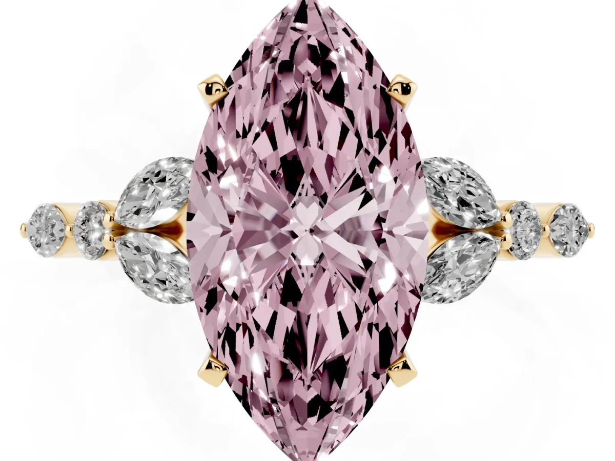 Fancy Pink Marquise Cut Diamond Solitaire Ring with Side Stones and Four-Prong Setting Yellow gold