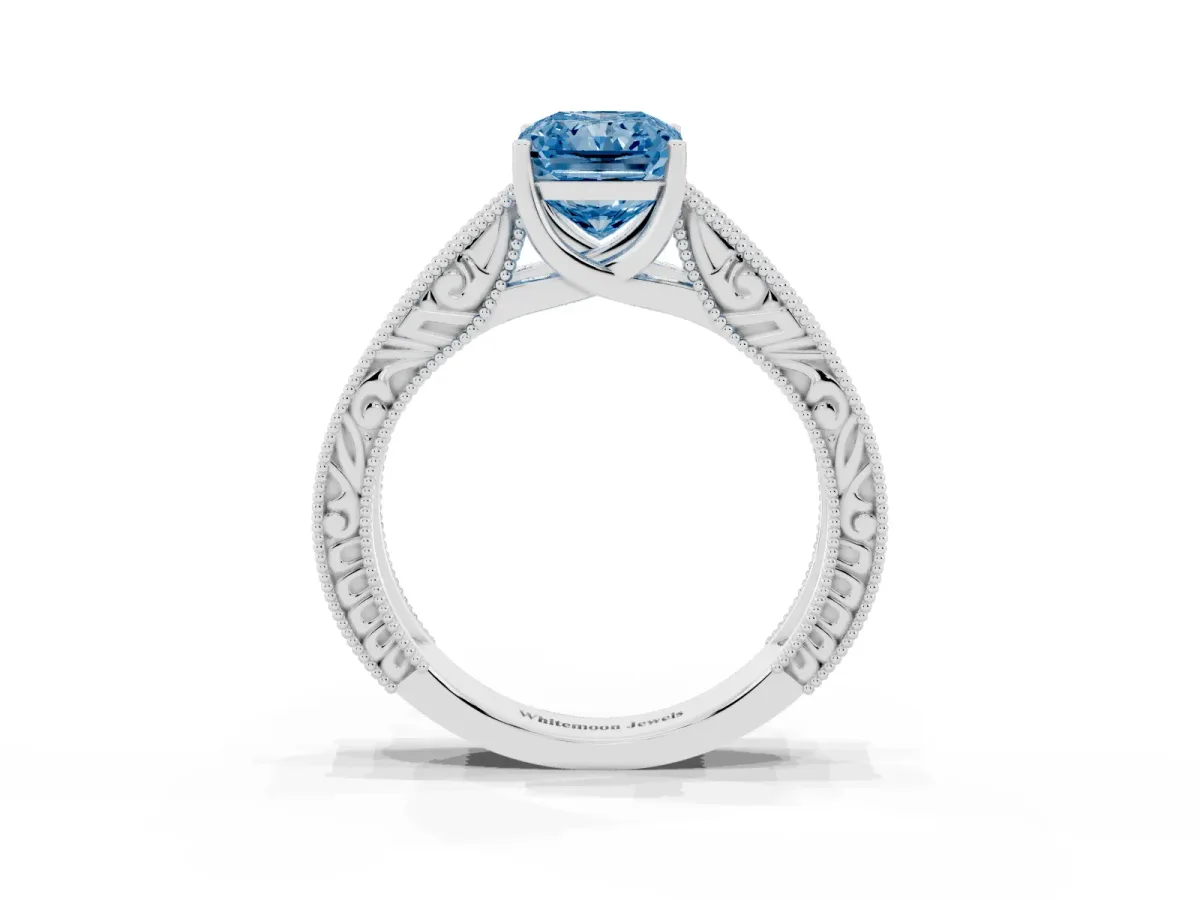 Fancy Blue Radiant Cut Diamond Solitaire Ring with Engraved Band and Four-Prong Setting White gold