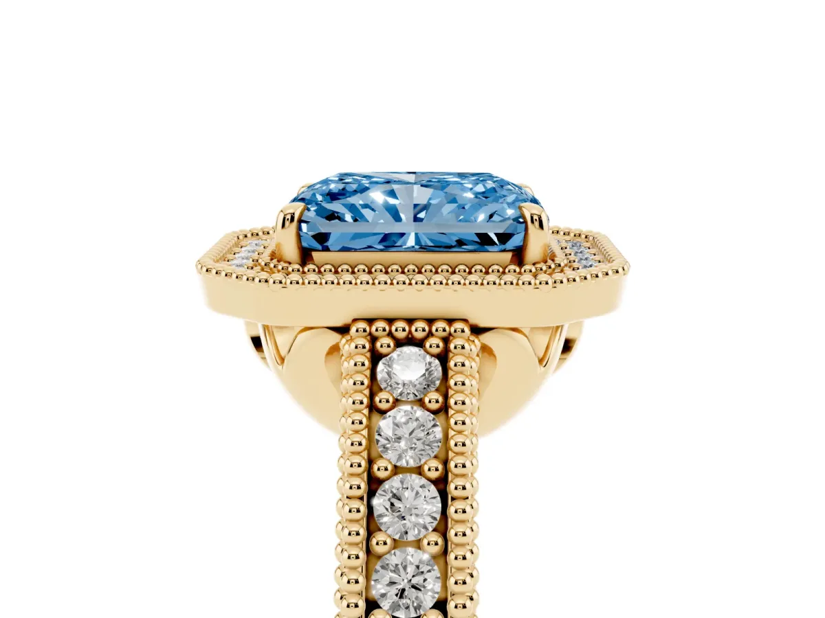 Fancy Blue Radiant Cut Cut Halo Diamond Ring with Pavé Band and Four-Prong Setting Yellow gold
