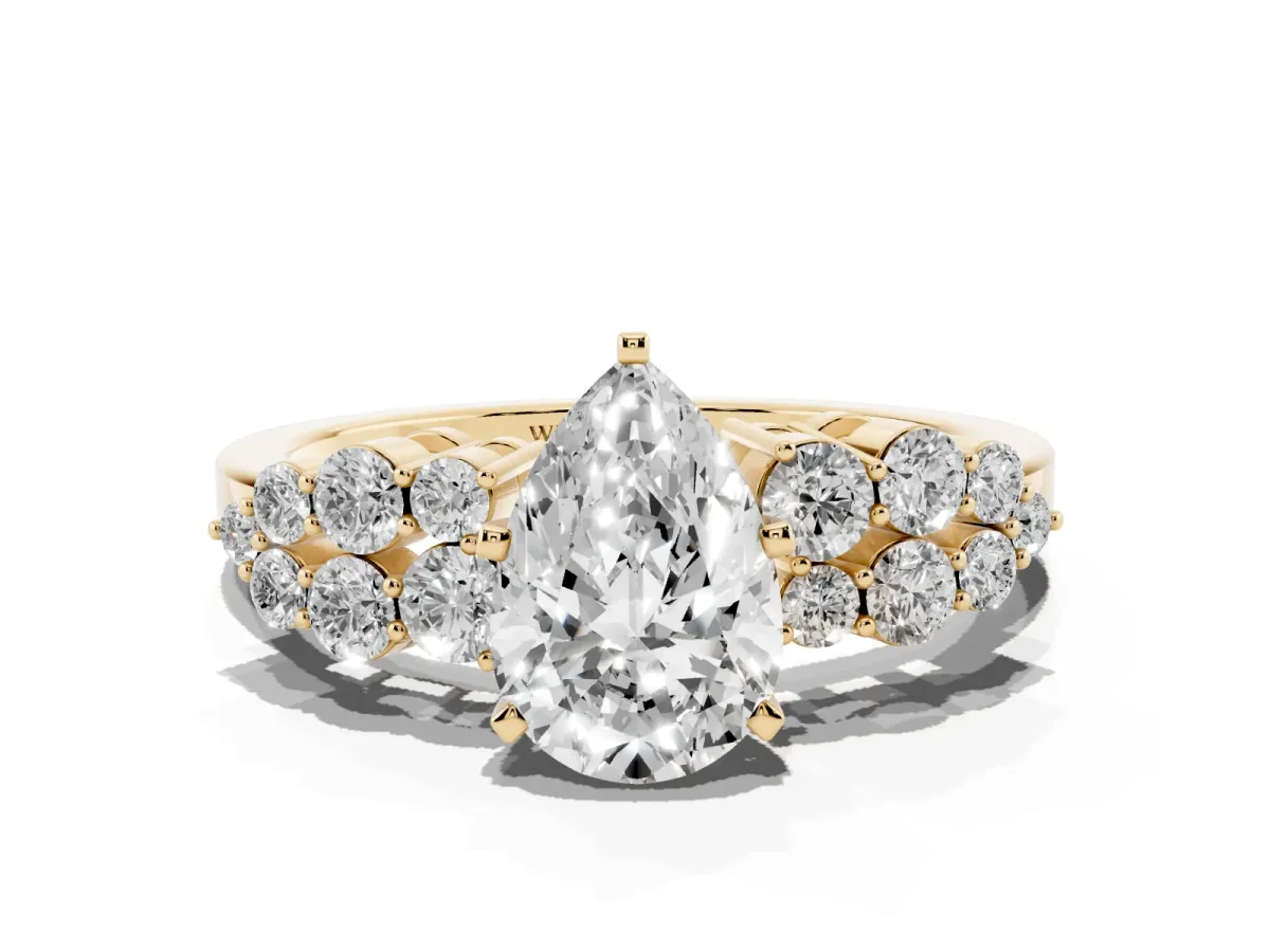 Pear Cut Cluster Diamond Engagement Ring with Pavé Band and Four-Prong Setting Yellow gold