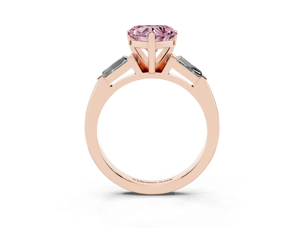 Fancy Pink Heart Cut Solitaire with Tapered Baguette Side Stones on a Classic Band with Four-Prong Setting Rose gold