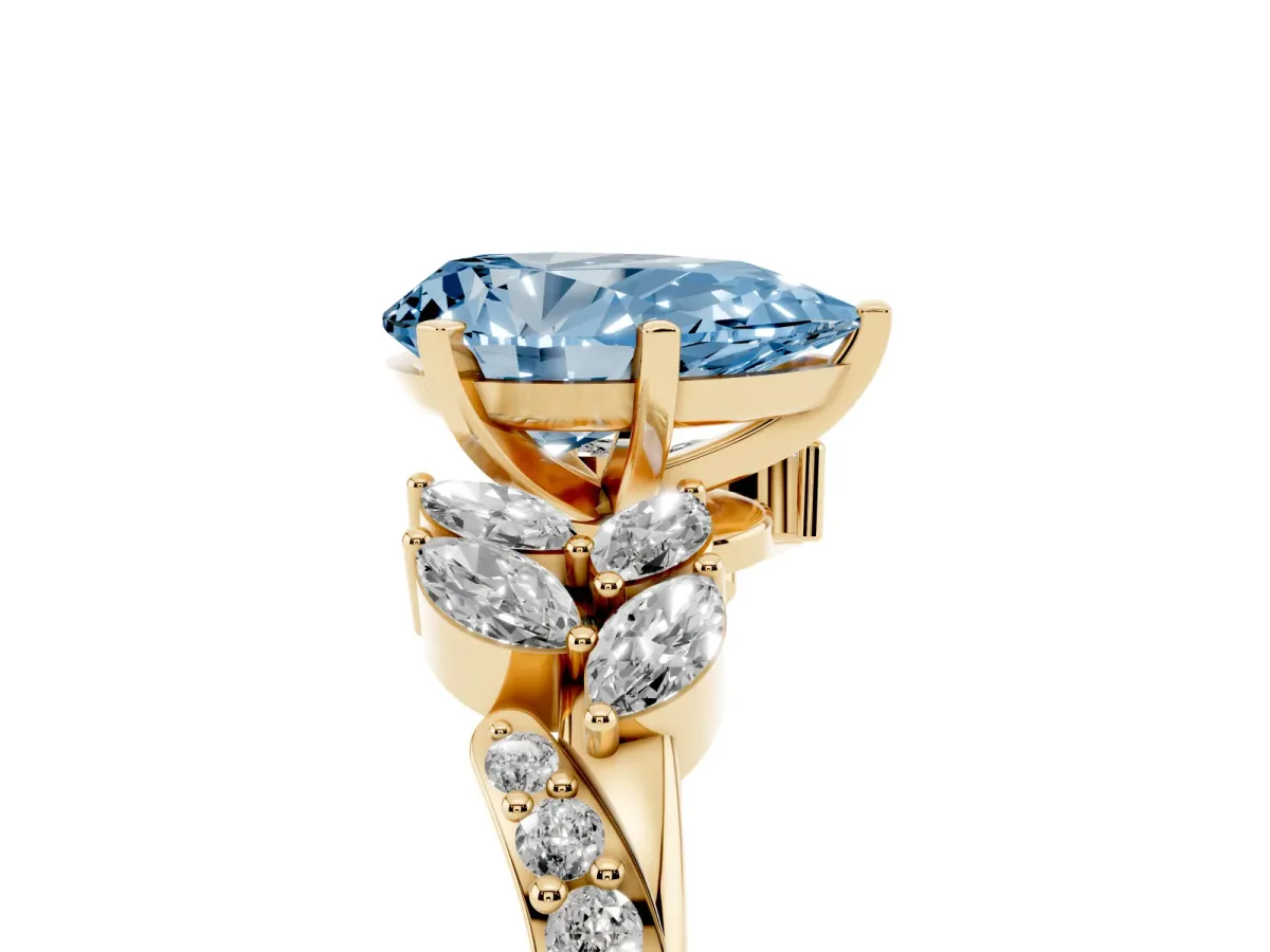 Fancy Blue Pear Cut Solitaire Marquise Twist Band with Six-Prong Setting Yellow gold