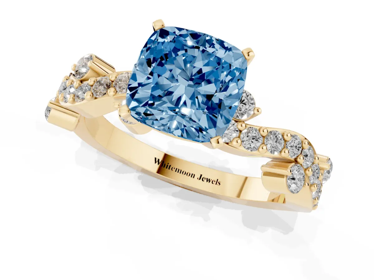Fancy Blue Cushion Cut Cut Solitaire Diamond Twisted Band with Pave Setting Yellow gold