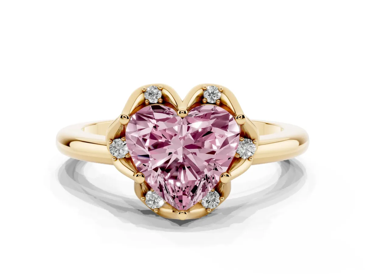 Fancy Pink Heart Cut Halo Diamond Ring with Round Cluster Setting, Solitaire Band, and Four-Prong Setting Yellow gold
