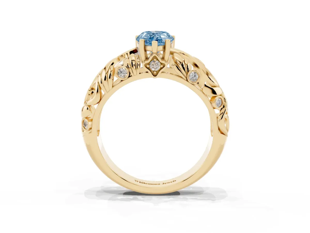 Fancy Blue Pear Cut Solitaire Diamond Leaf-Inspired Vine Band Ring with Prong Setting Yellow gold