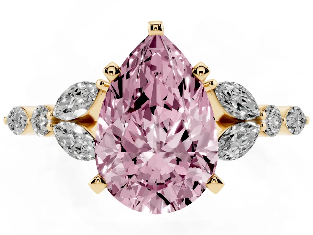 Fancy Pink Pear Cut Diamond Solitaire Ring with Side Stones and Four-Prong Setting Yellow gold